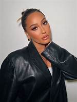 Adrienne Bailon Explains Why She Kept Her Baby News Quiet