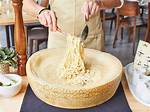 Pasta in Cheese Wheel Nyc: a Culinary Delight