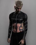 The Intricate Canvas: Machine Gun Kelly's Tattoos